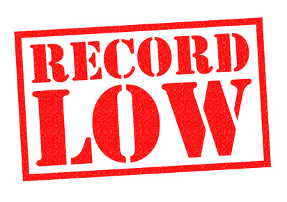 RECORD LOW red Rubber Stamp over a white background.
